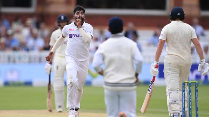 India bowler Mohammed Siraj celebrates after taking the