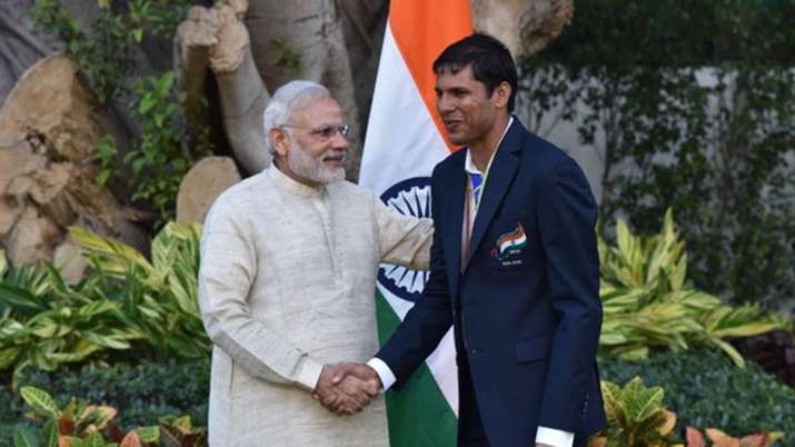Prime Minister Narendra Modi with Devendra Jhajharia