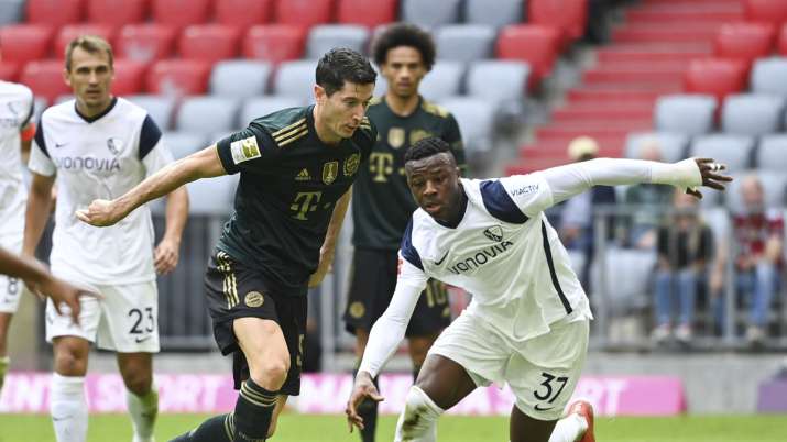 Munich's Robert Lewandowski , left, and Bochum's Armel