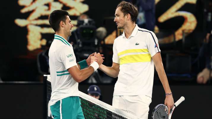Novak Djokovic of Serbia and Daniil Medvedev of Russia