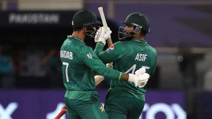 Asif Ali of Pakistan celebrates with batting partner Shadab Khan after his win at Cric