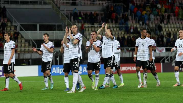 Niklas Sule of Germany leads his teammates as they applaud the fans after the 2022 FIFA World Cup Q