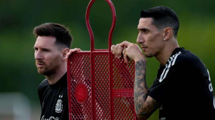 Argentina's Lionel Messi, left, and Angel Di Maria, attend a team training session ahead of a FIFA W