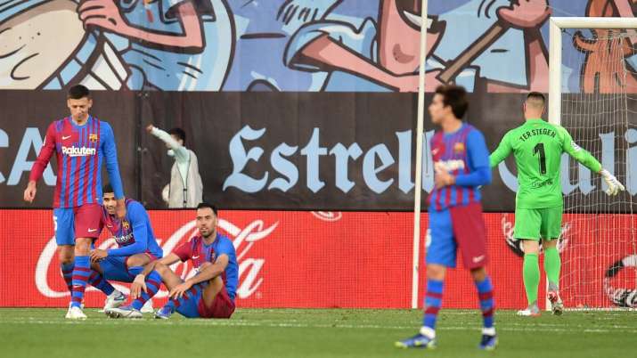 FC Barcelona players react to conceding a late goal during the La Liga Santander match between RC Ce