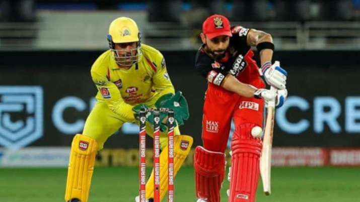 File photo of CSK's MS Dhoni (in yellow) and Virat Kohli.