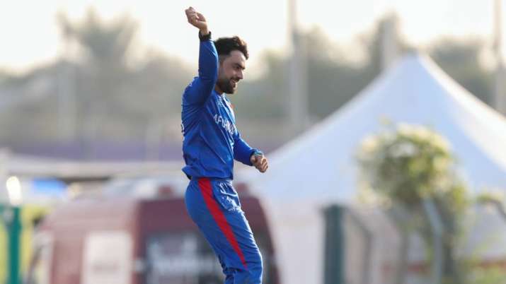 Afghanistan's Rashid Khan celebrates after taking the wicket of New Zealand's Martin Guptill during 