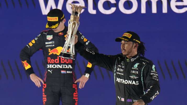 Mercedes driver Lewis Hamilton celebrates winning the Saudi Arabian GP in front of rival and second-