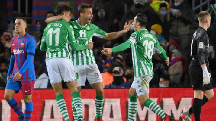 Real Betis' midfielder Cristian Tello (second from left), and teammates Sergio Canales (centre) Andr