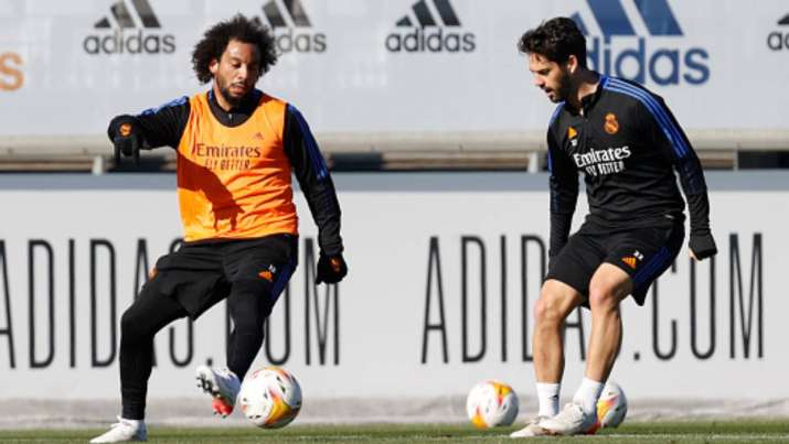 Real Madrid's Marcelo and Isco in action during a training session at Valdebebas training ground in 