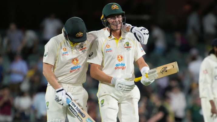 Australia's Steve Smith (left) and Marnus Labuschagne walk off the field at stumps on Day 1 of the A