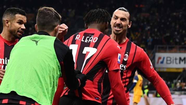 AC Milan's Zlatan Ibrahimovic (far right) celebrates with goal-scorer Rafael Leao after team's third