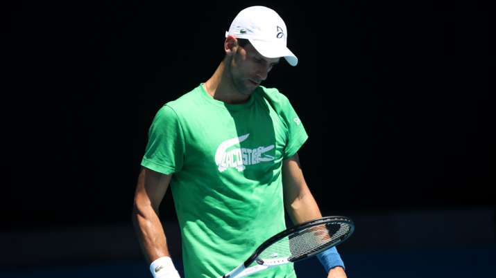 Novak Djokovic of Serbia looks on during a practice session ahead of the 2022 Australian Open.