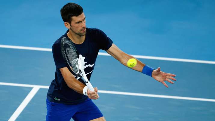 Novak Djokovic of Serbia plays a forehand during practice session ahead of the 2022 Australian Open.